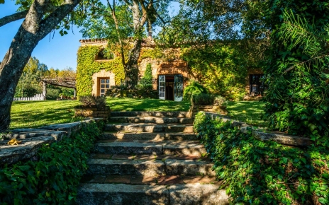 Steps from parking to gardens and property